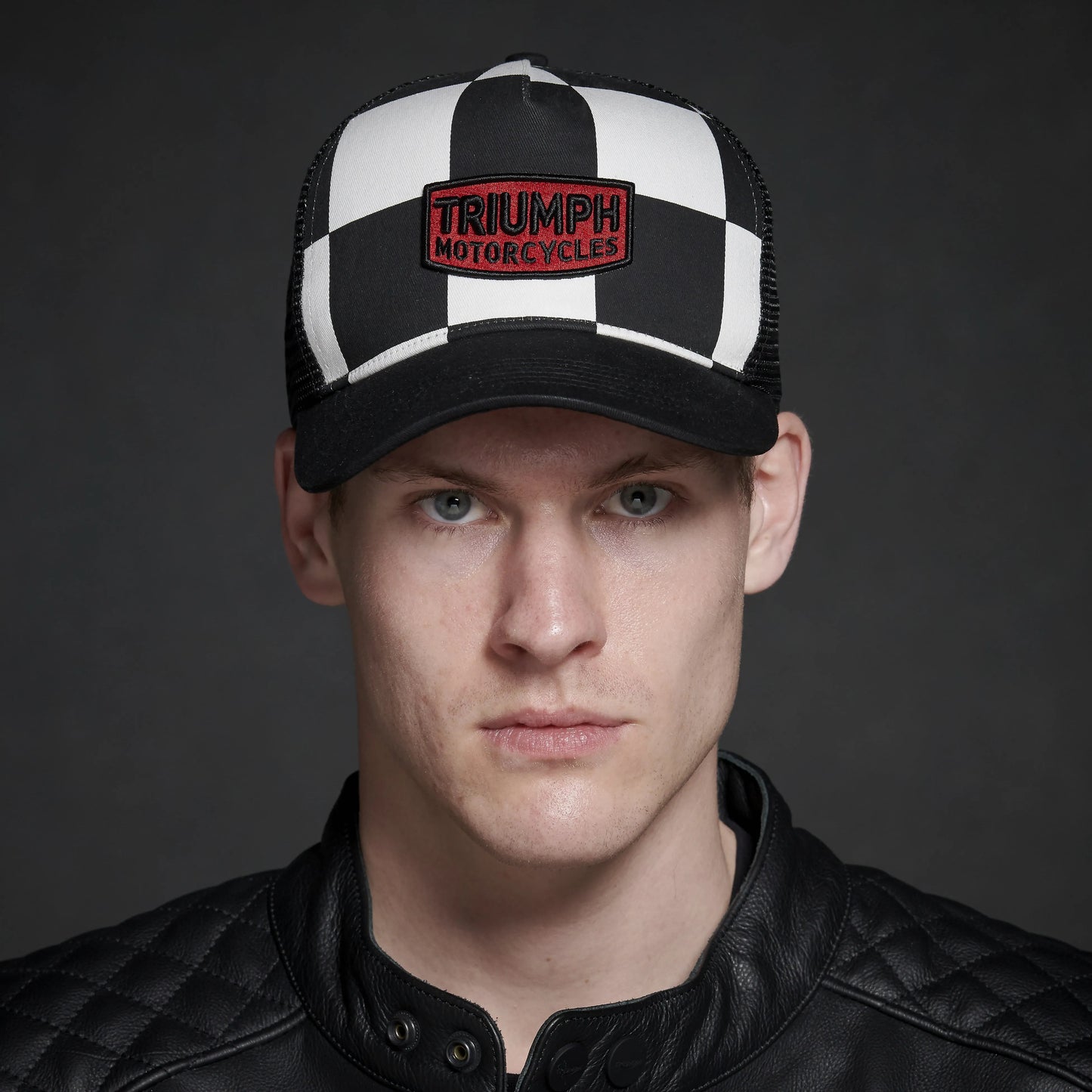 Triumph Pritchard Trucker Cap in Black, Bone & Red