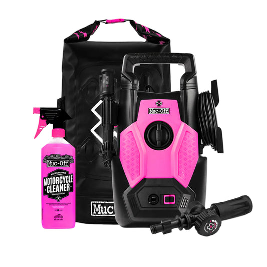 Pink and black pressure washer with cleaning solution bottle and accessories on a white background
